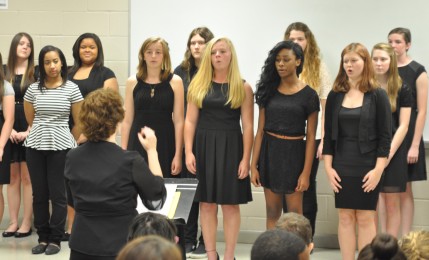 Beginning choir performs My Favorite Things for a group of parents. 