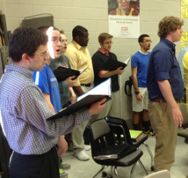 Vocal 4 students perform in the choir room to a select group of students. 