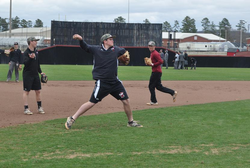 The baseball team uses an off day to continue to hon skills. 