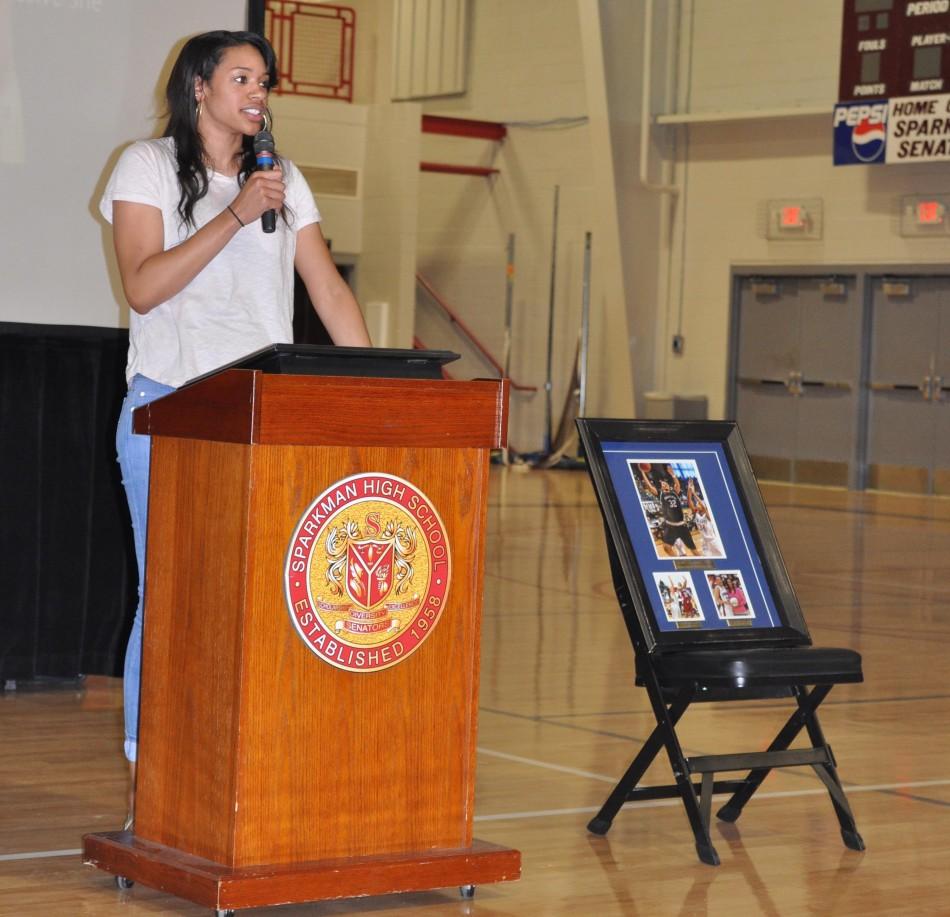 Senior Alexis Jenninngs adresses the crowd as she gets the news that her jersey has been retired.