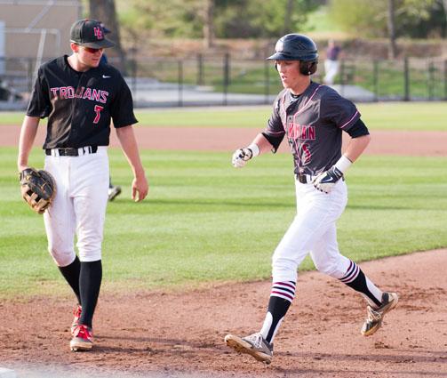 Junior Will Sipes takes his run around the bases against Hazel Green in the playoffs. 