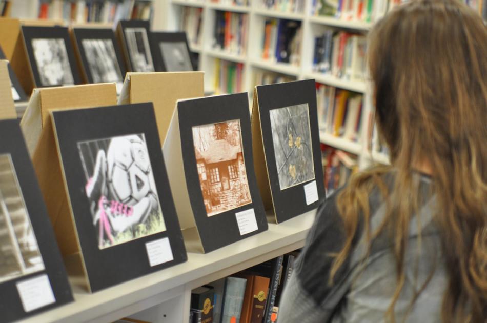 Photo teacher Eric Mittman turns the library into an art gallery for this weeks photo show. 