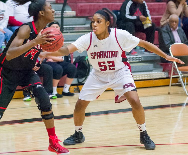 Keandra Dawkins guards a Hazel Green player during the home game. 