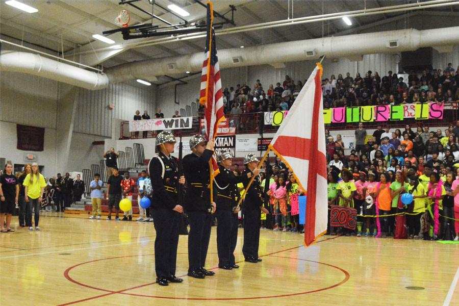 Before begining the pep rally in support of the football players, the gym had a moment of silcence for the 9/11 victims.