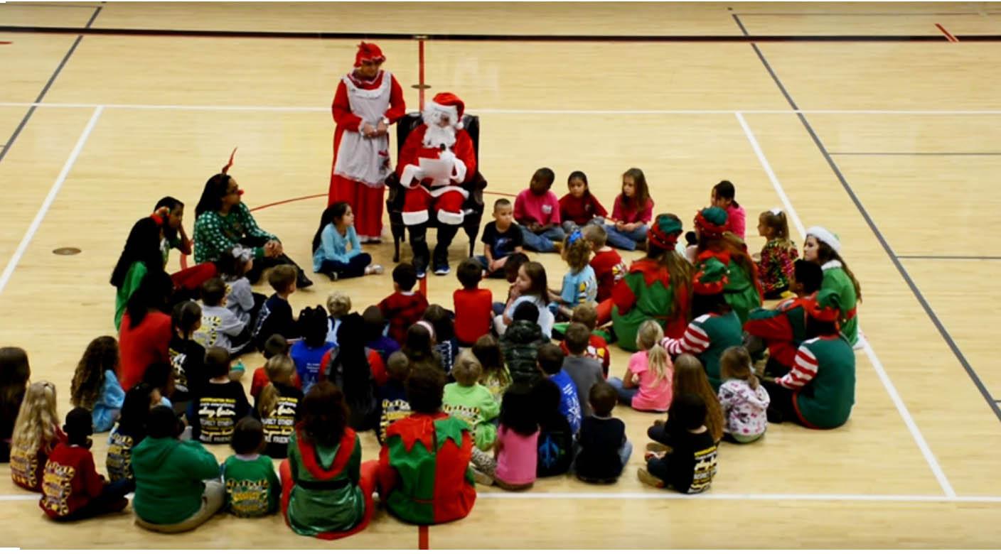 Students bring holiday cheer to elementary students