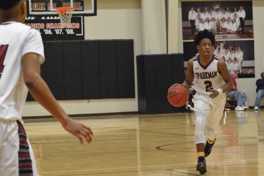 Senior Brandon Miller brings the ball up the court. 