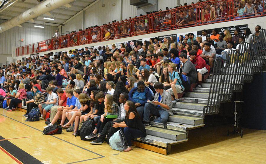 The sophomore class gathers on the north side of the gym to get information on class rings and dress code. 