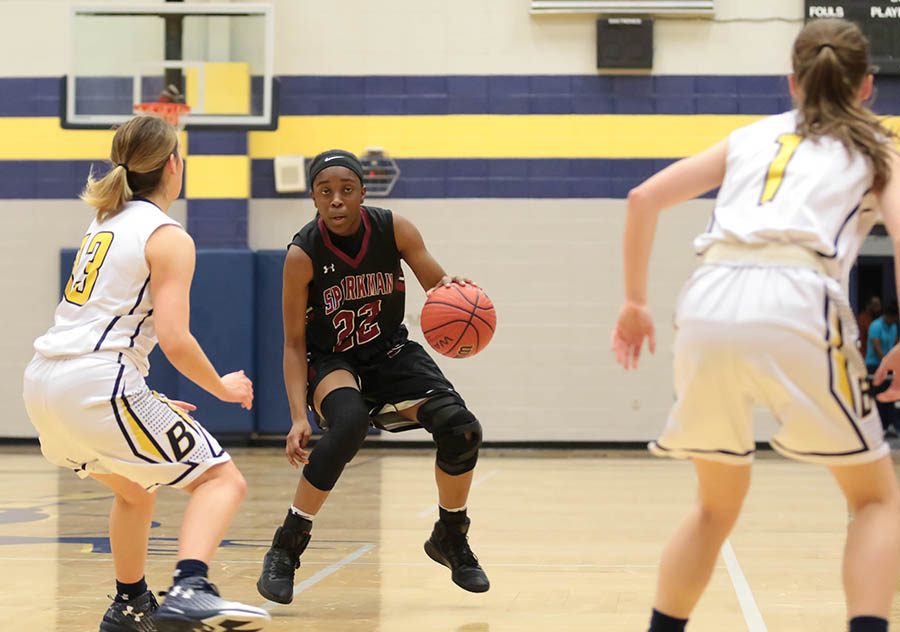 Senior Terri Smith dribbles the ball through Buckhorn defenders on Jan. 13. 