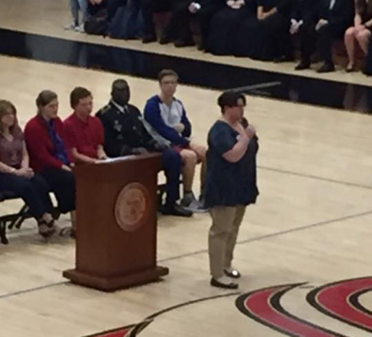 Specialist Tammy Johnson addresses the student body about her experiences in Desert Shield. 