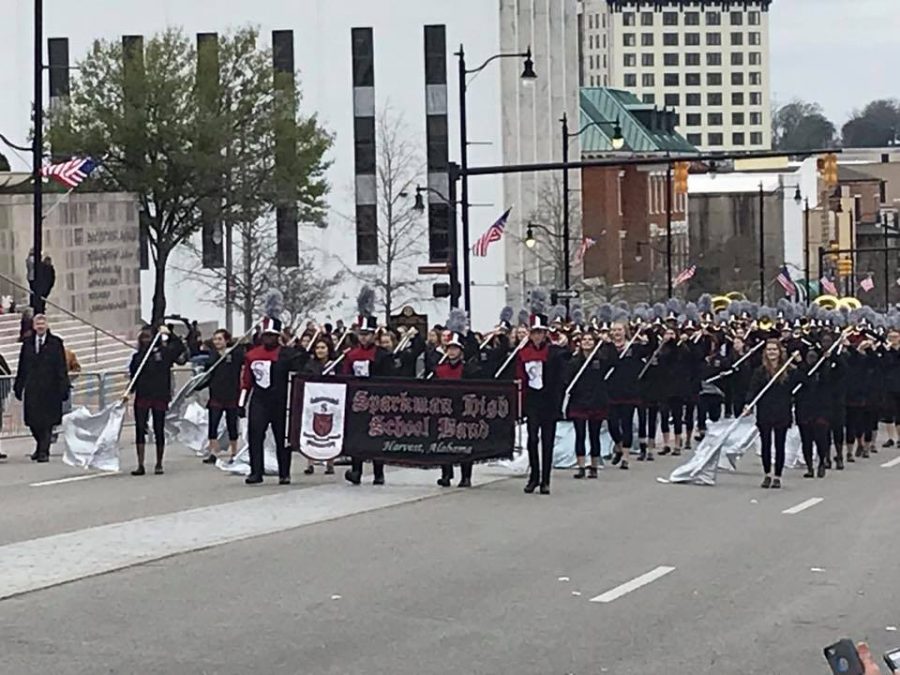 The band marches down the streets of Montgomery. 