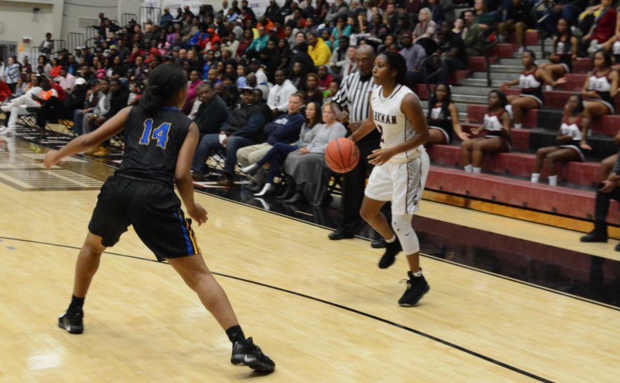 Senior+Deyanna+Dodd+looks+for+the+opportunity+to+shoot+a+three.+