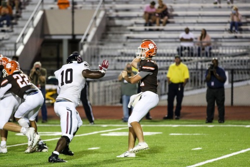 Junior Karon White gets in the face of Grissoms quarterback Jakob Foss. Whites performance in the game allowed him to be up for Al.coms player of the week. 