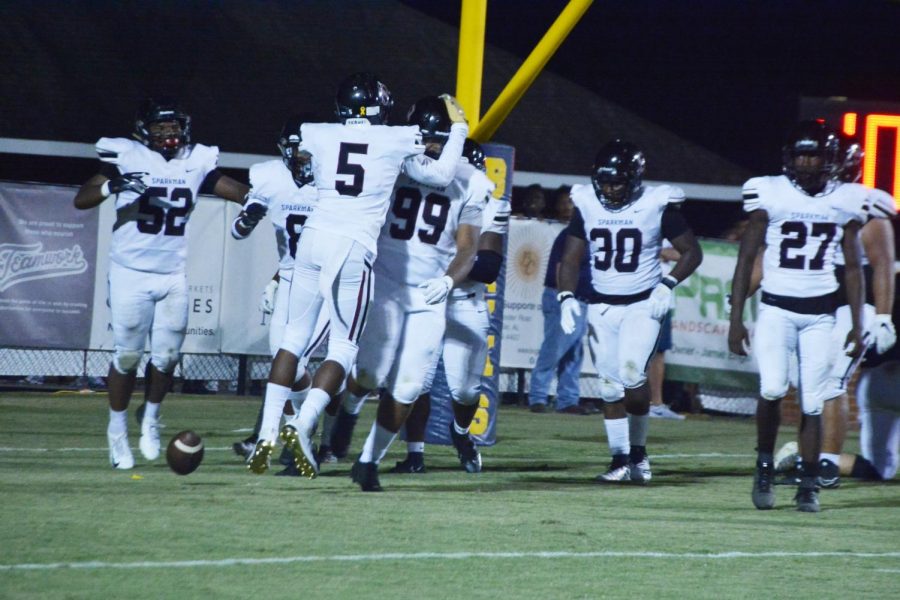 The team celebrates after a touchdown was scored against Buckhorn. The team won 38-0. 