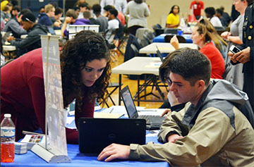 Calhoun college representative assists senior Parker Barlow in applying to their school. Students were given multiple options to apply. 