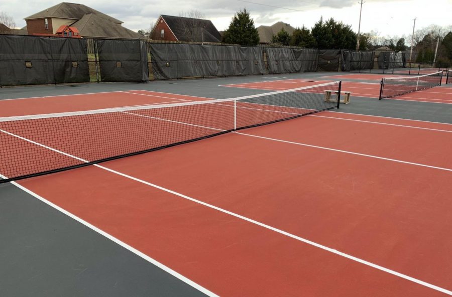 Tennis Team Begins Season On New Courts