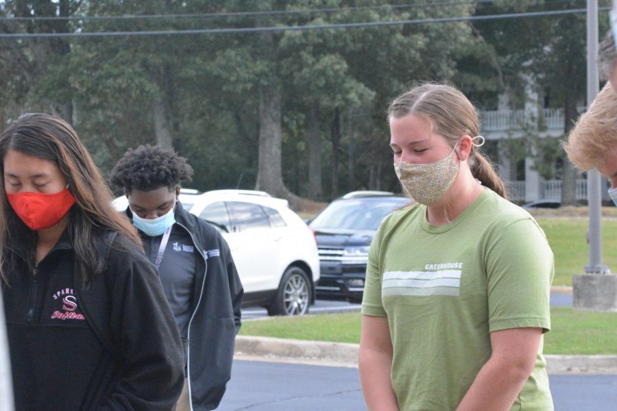 Seniors Elanor Stokes and Bailey Abernathy participate in the annual See You at the Pole event. 