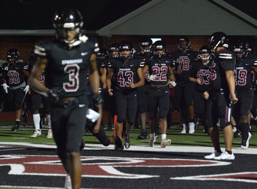 The football team takes to the field for a home game with Austin. 