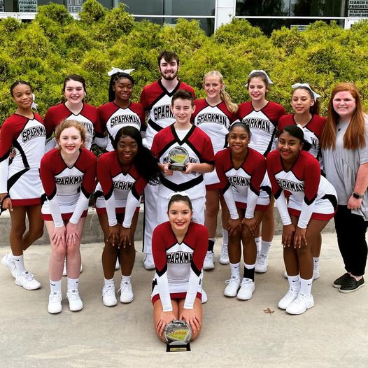 The JV team takes time to pose for a quick victory photo after being name substate champions and placing 2nd in the Gameday category.