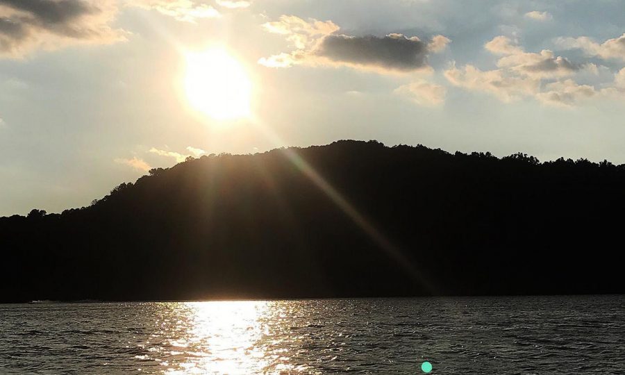 Sophomore Makayla Barchett captures the sun setting over the lake. 