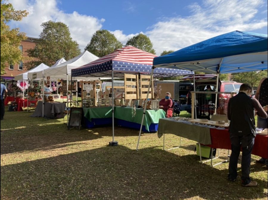 Local vendors set up tents, featuring their homemade wares. 