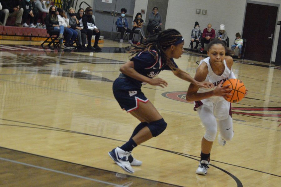 Running past a Bob Jones defender, sophomore Kennedy Langham prepares to make a play. 