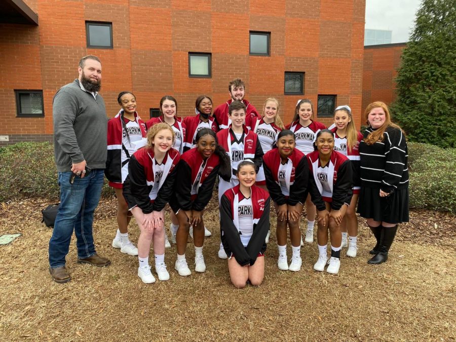 The JV cheer teams poses for a quick photo outside of the Wallace State facility where state championships were held. 