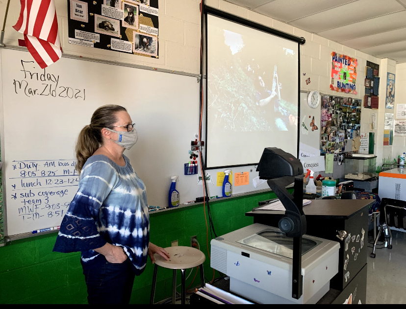 Delivering a lesson on conservation, Mrs. Ginny Conquest questions her second period class. 