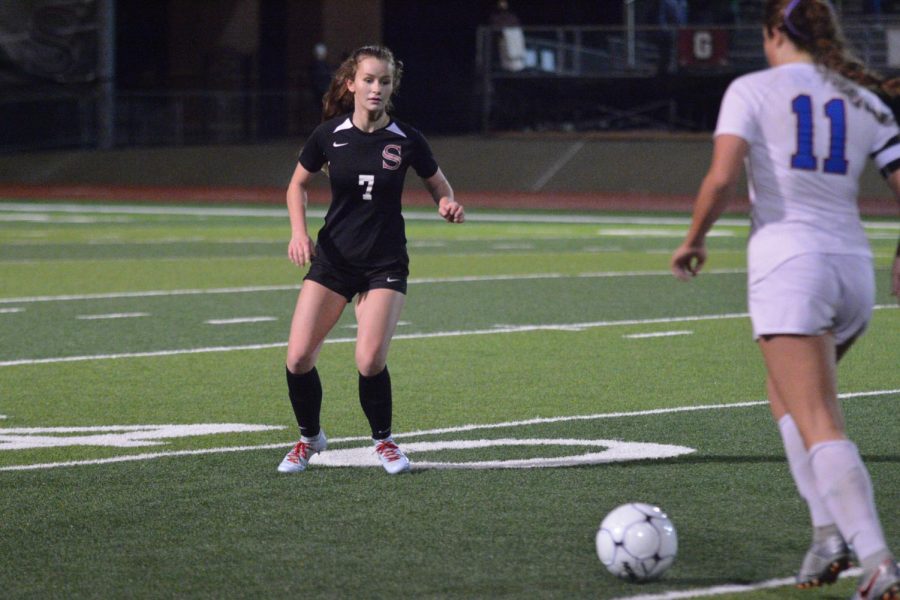 Waiting on the opponent to make her kick, junior Sammie Clegg anticipates her next move. 