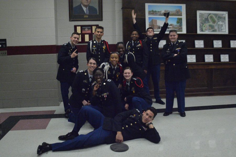 Senior Colin Romiza (top left) poses with his fellow JROTC cadets for his final senior night.