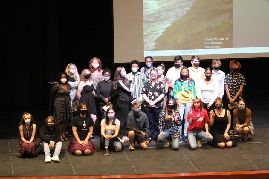 The lit mag staff takes a bow after their showcase on May 25. 