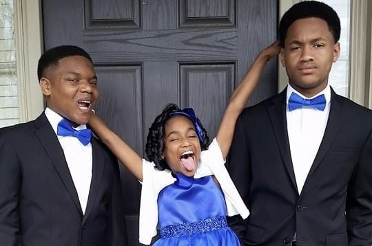Bria Howard with her two older brothers in 2015