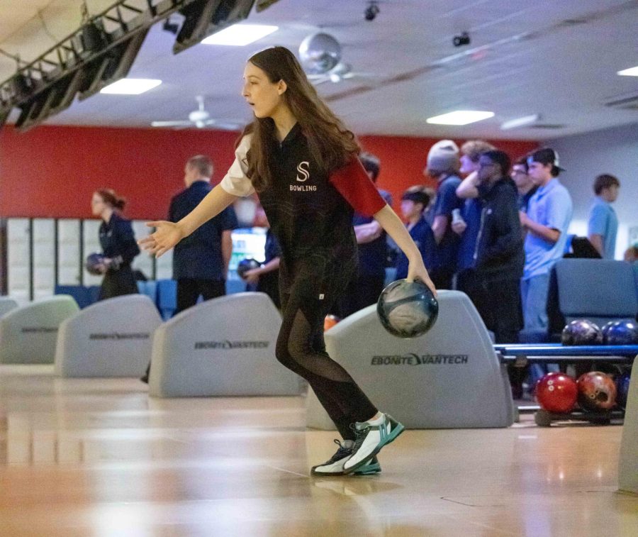 Preparing+to+release+the+ball%2C+sophomore+Jenna+Webber+looks+to+bowl+a+strike.+Webber+had+a+successful+season%2C+especially+at+the+state+championships.+