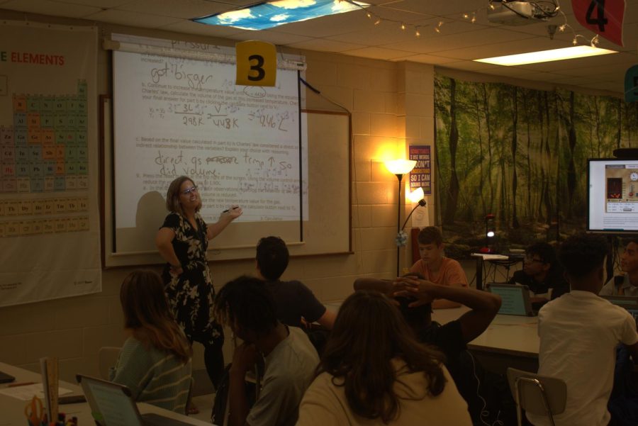 Biology Teacher Amber Kimbrell draws her students eyes to the board a she tells them the plan for the days lesson.