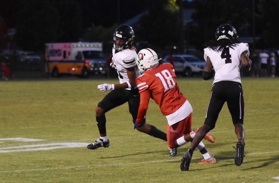 Senior Matt Rozier avoiding one of the Hazel Green players