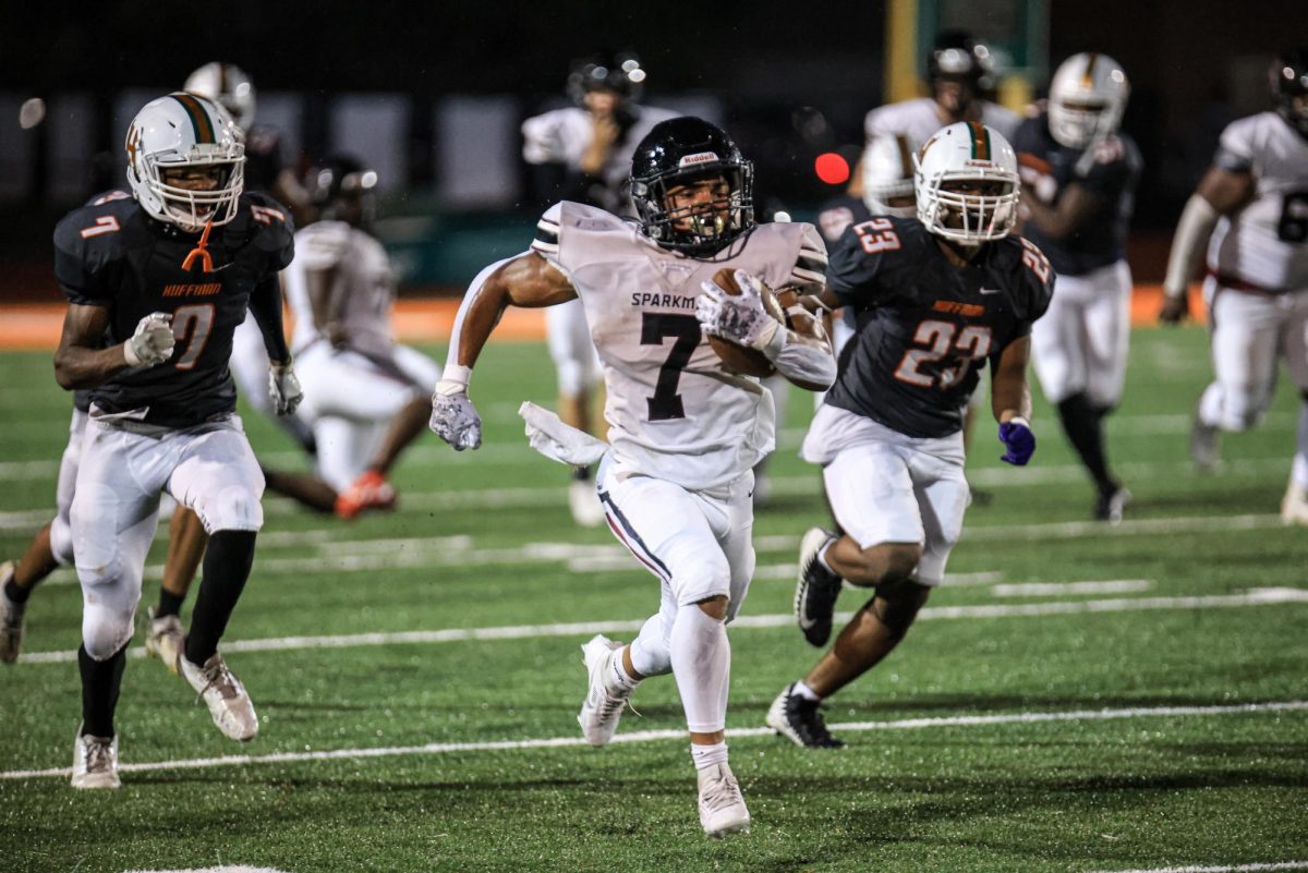 Jayden Thomas making his way towards the end zone for a touchdown.