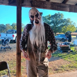 In full costume, senior Wyatt Harris gets ready for a shift at Doomsday. 