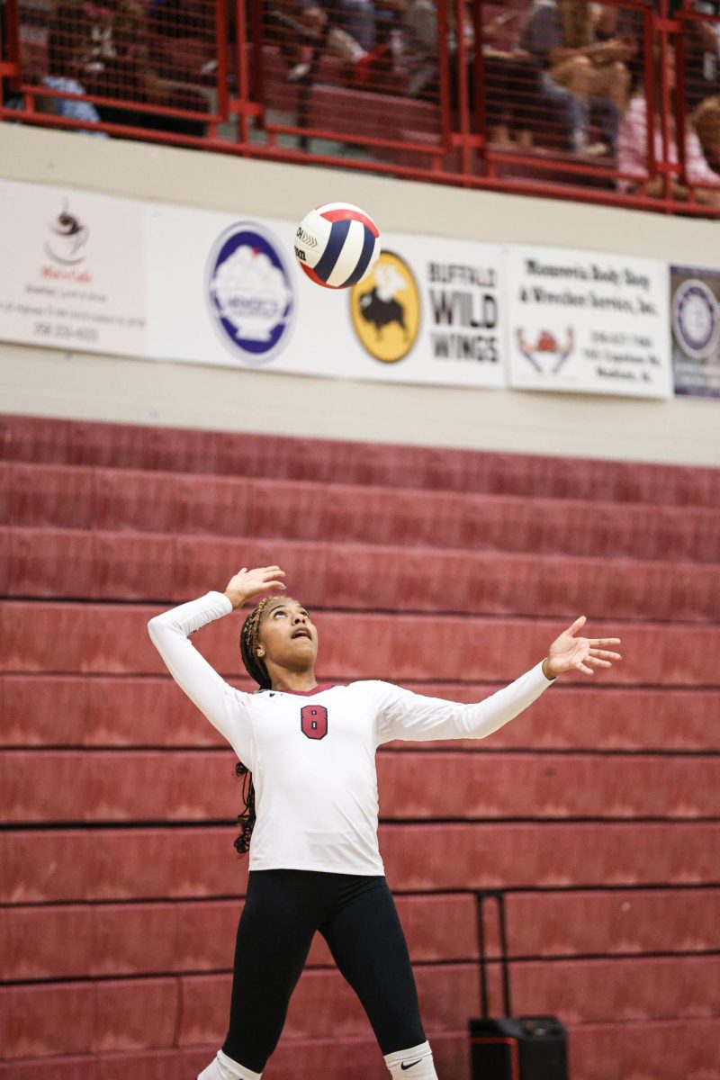 JaLa Blackwell about to serve the ball.