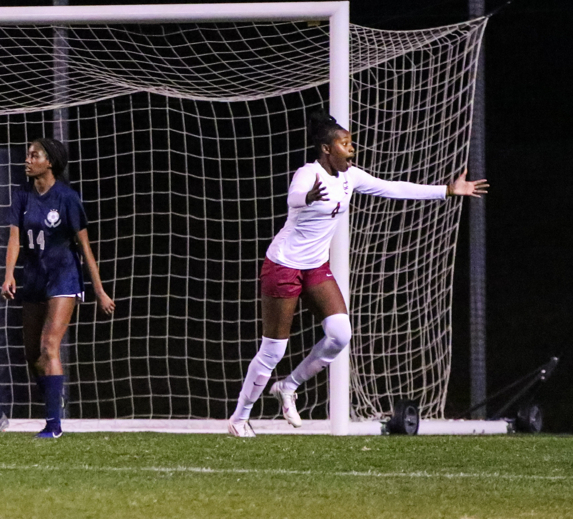 Senior Imani Hamilton celebrates after blocking a goal. 