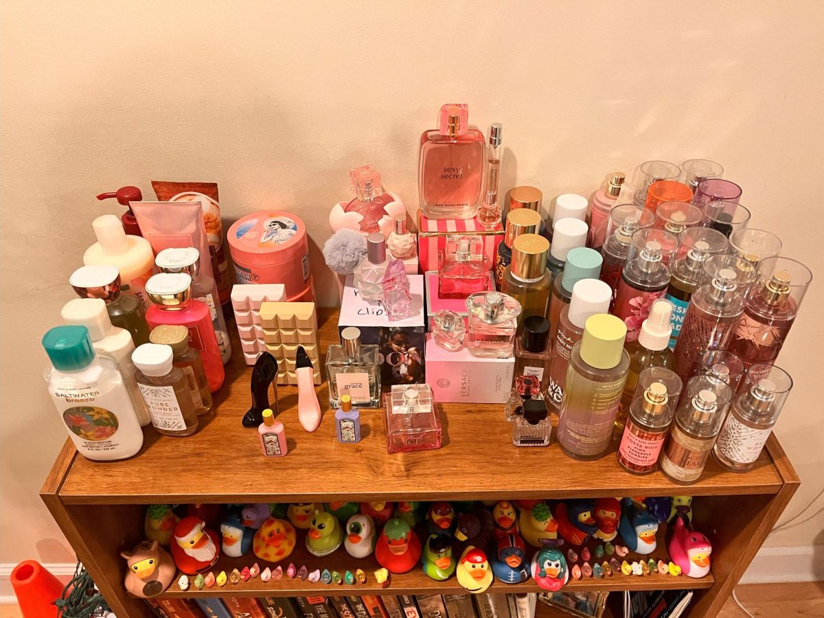 Braley Foust displays her vast collection of perfumes and lotions in her bedroom. 